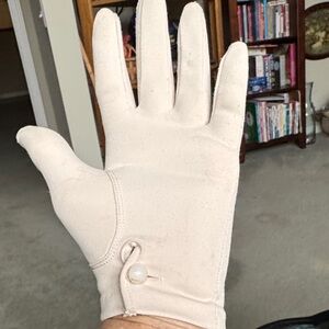 Vintage cream colored gloves with button